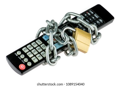 The Television Black Remote Control Is Closed By The Brass Padlock With A Metal Chain Isolated On White Background. Concept Of Unavailable Video Content Or Lack Of Spare Time For Watching