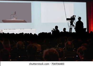 Television Press Conference Production Cameraman And Crowd Silhouette. Clipping Path