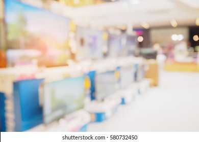 Television Shelf In Eletronic Department Store Blurred Background