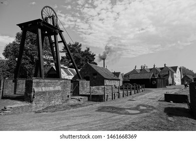 Telford, England, 25th July 2019. Pit head winding gear at an old 1900s Victorian coal mine.