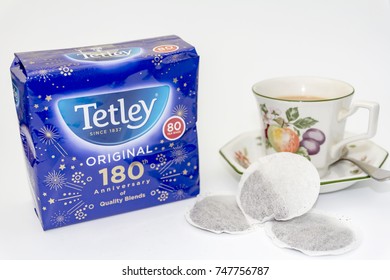 TELFORD, SHROPSHIRE, U.K. 3 NOVEMBER 2017 Tetley Original 180th Anniversary Packet With A Cup Of Tea To The Side And Tea Bags To The Front