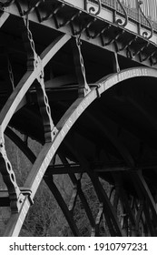 TELFORD, UK - February 18, 2013. The Iron Bridge, The First Cast Iron Arch Bridge Built At The Start Of The Industrial Revolution. Ironbridge Gorge, Telford, Shropshire, UK. Monochrome Image.