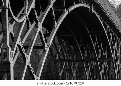 TELFORD, UK - February 18, 2013. The Iron Bridge Historical Landmark Near Telford, The First Cast Iron Arch Bridge Built In The Industrial Revolution. Ironbridge Gorge, Telford, Shropshire, UK