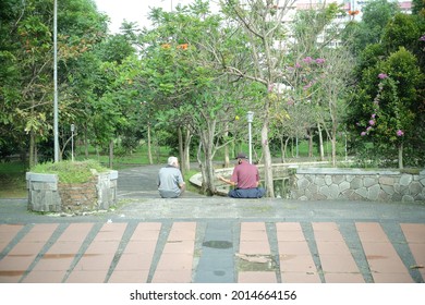Telkom University - 02 07, 2021 : Elderly People Talking In The Park