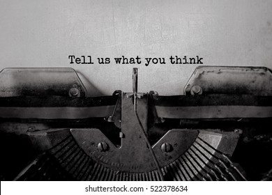 Tell us what you think typed words on a vintage typewriter - Shutterstock ID 522378634
