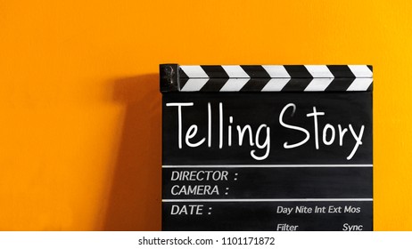 Telling Story Title On Wooden Clapper Board