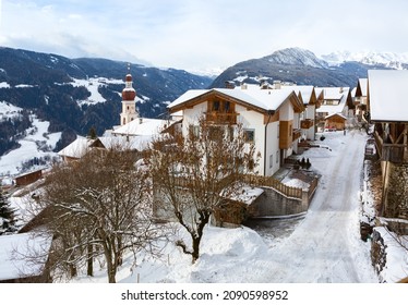 Telves Village Street In Winter Day,  Near Sterzing, South Tyrol, Dolomites, Southern Limestone Alps, Northern Italy.