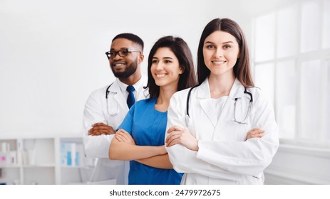 Tem of Confident Doctors And Interns Standing In Hospital With Crossed Arms - Powered by Shutterstock