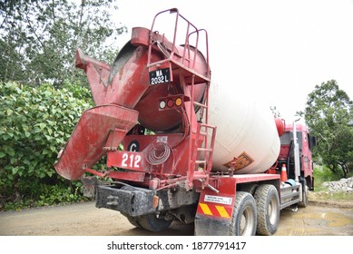 Temerloh, Pahang, Malaysia : 17th December 2020 - Red Cement Mixer Truck