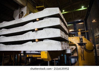 Temirtau, Kazakhstan - June 09, 2012: Concrete Sleepers Manufacturing Plant NORD Prom NS. Stack Of Ready Sleepers In Workshop. No People.