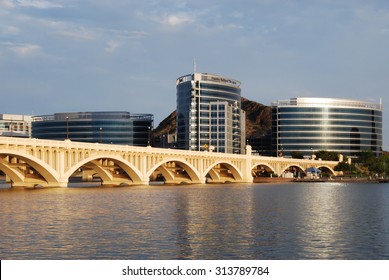 Tempe, Arizona, - USA - September 2, 2015: Time exposure of  the newest modern office buildings at Tempe Town Lake with the Mill Ave Bridge in foreground.
