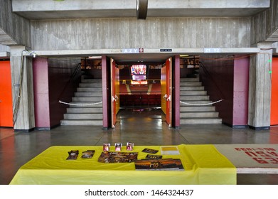 TEMPE, AZ / USA - FEBRUARY 6 2011:  A Table With Sports Memorabilia In The Lobby Of ASU Wells Fargo Arena During A Women's Gymnastics Competition.