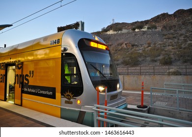 TEMPE, AZ / USA - JANUARY 8 2011:  A Valley Metro Light Rail Trolley Headed Eastbound For Mesa Stopped With Doors Open At Tempe Transportation Center.