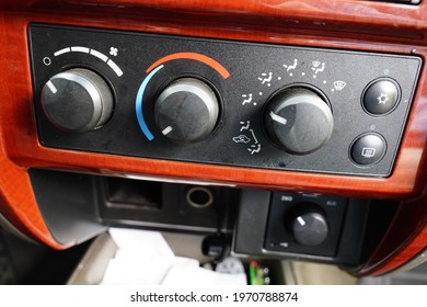 Temperature Climate Control System Knobs On The Center Console Inside Of A Truck In Fond Du Lac, Wisconsin 