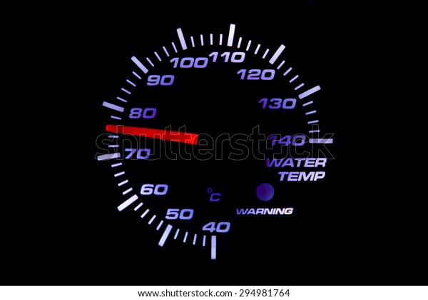 Temperature gauge\
in car at 76 degrees\
centigrade.