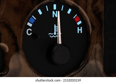 Temperature Gauge At Normal Operating Temperature In Car Dashboard In Illuminated Night Mode