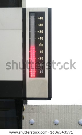 The temperature outside is below zero degrees Celsius. Street temperature meter close-up                            