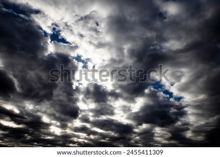 Tempestuous clouds in breathtaking azure sky.