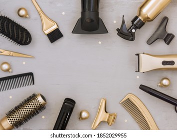 Template For New Year And Christmas Greetings With Hairdresser's Tools. Gold And Black Hair Salon Accessories And Balloons On A Gray Background.