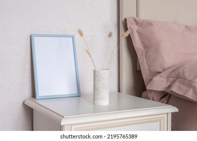 Template With Photo Frame On A Bedside Table. Bouquet Of Lagurus. Sunlight From The Window.