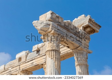 Temple of Apollo in Side (Turkey). Close up fragment of the entablature of the ruined temple. Stone-cut relief on the frieze. History, art or architecture concept