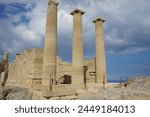 The Temple of Athena Lindia was a sanctuary on the Acropolis in Lindos, dedicated to the goddess Athena. An acropolis was the settlement of an upper part of an ancient Greek city. Rhodes Island