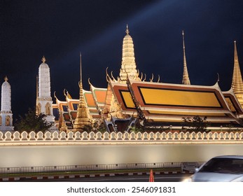 The Temple of the Emerald Buddha and the Grand Palace view at the night time in Bangkok, Thailand. Tourist Attraction place. - Powered by Shutterstock