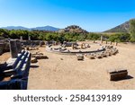 The temple terrace and the round structure ruins at the Kaunos ancient city. Kaunos is located near Dalyan town in Mugla Province, Turkey.