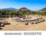 The temple terrace and the round structure ruins at the Kaunos ancient city. Kaunos is located near Dalyan town in Mugla Province, Turkey.