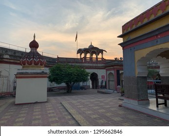 Temple At Top Of Parvati Hill In Pune, India At Sunrise Work Colorful Sky