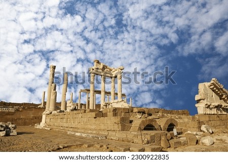 Temple of Trajan in ancient city Pergamon, Bergama, Turkey in a beautiful summer day. Ruins of the Temple of Trajan on a background of blue sky. Bergama, Turkey. Turkey Pergamon Ancient City.
