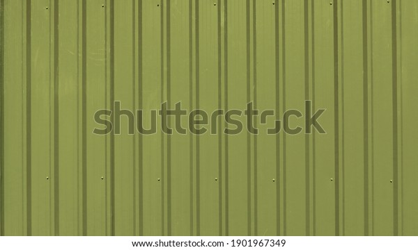 Temporary\
corrugated yellow wall partition with\
rivet