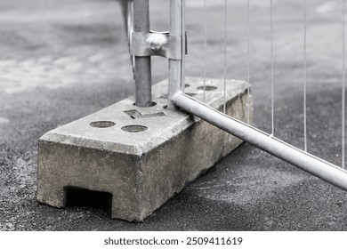 Temporary Fence on Construction Site Close up. Galvanized Welded Wire Mesh Fence with Solid and Strong Base Support. Temporaty Fencing. - Powered by Shutterstock