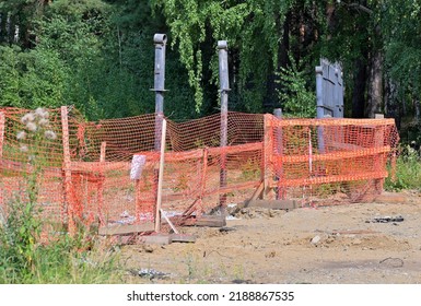 Temporary Fencing Of The Repair Site On A Summer Day