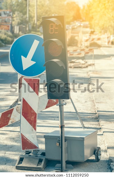 Temporary transportable roadworks traffic signal system\
at road works.  
