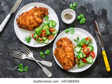 Tempura Chicken Chop With Rice And Fresh Vegetable Salad On A Dark Background, Top View