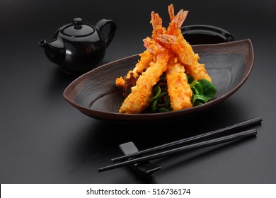 Tempura Shrimp On A Black Plate