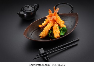 Tempura Shrimp On A Black Plate