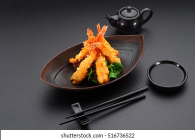 Tempura Shrimp On A Black Plate