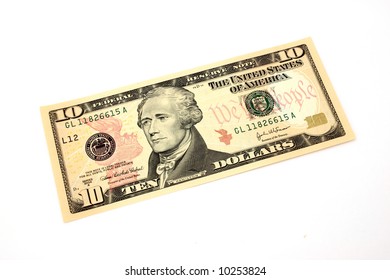 Ten Dollar Bill Over A White Surface