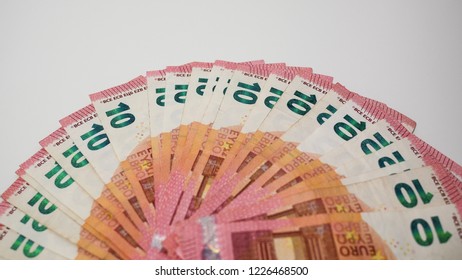 Ten Euro Banknotes Fanned Out On A White Desk, Overhead Top Down View