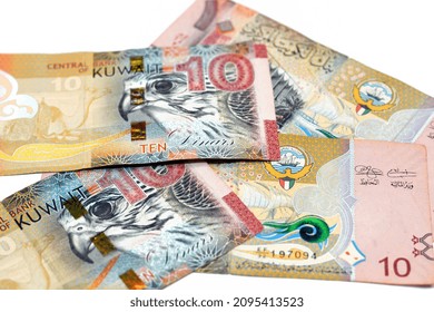 Ten Kuwaiti Dinars Bill Banknote 10 KWD Features The National Assembly Of Kuwait, Sambuk Dhow Ship, Falcon And Camel Dressed In A Sadu Saddle, Kuwaiti Dinar Is The Currency Of State Of Kuwait Isolated