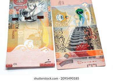 Ten Kuwaiti Dinars Bill Banknote 10 KWD Features The National Assembly Of Kuwait, Sambuk Dhow Ship, Falcon And Camel Dressed In A Sadu Saddle, Kuwaiti Dinar Is The Currency Of State Of Kuwait Isolated