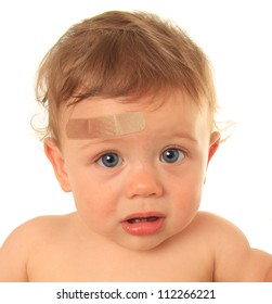 Ten Month Old Baby Boy With Band Aid.