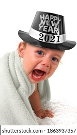 Ten Month Old Baby Boy Crying And Wearing A Happy New Year Tophat. 2021