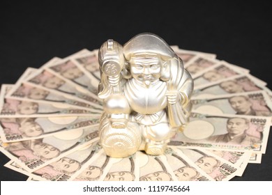 Ten Thousand Japanese Yen Bills And Daikoku God