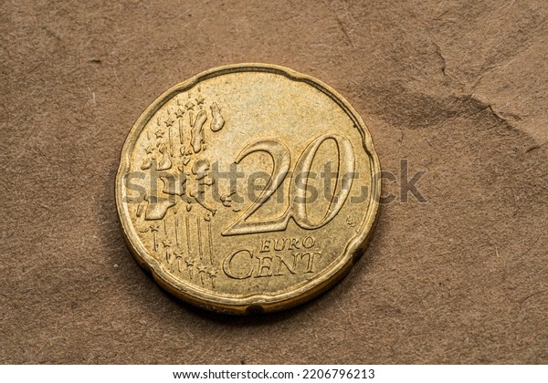 Ten, Twenty, Fifty euro cent lying on the rough paper
background. 