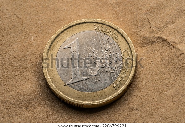 Ten, Twenty, Fifty euro cent lying on the rough paper\
background. 