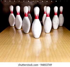 Ten White Pins In A Bowling Alley