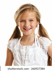 Ten year old caucasian girl with long hair posing isolated on white.